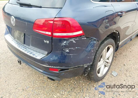 2014 Volkswagen Touareg 3.6L R-Line z USA, uszkodzony, nr VIN WVGDF9BP8ED015095